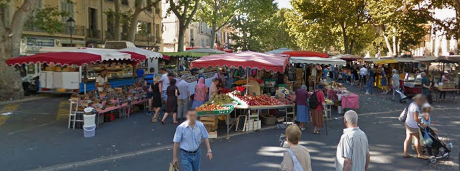 1 of 1, People in fruit stands at Place des Prêcheurs in Aix-en-Provence with fountain