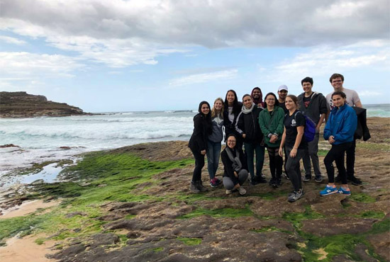 UC San Diego psychology-cogsci students on beach in Australia