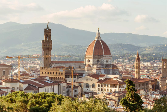 Firenze, Italy - overlooking the city and towers - photo by Giuseppe Mondi, unsplash.com/@masinutoscana